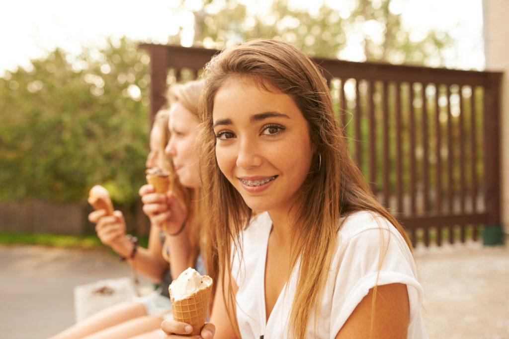 Shot of teenage girlfriends having ice cream
